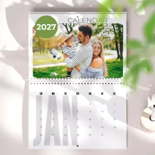 Image of a personalised calendar from RapidStudio, showcasing custom photos for each month, perfect for keeping cherished memories in view all year round.