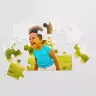 Custom photo puzzle featuring a baby in a colourful outfit, with one piece being held to fit into the puzzle. The puzzle has a vibrant background with green, yellow, and red hues. Ideal for personalised gifts in South Africa, baby shower gift ideas, and unique photo albums.