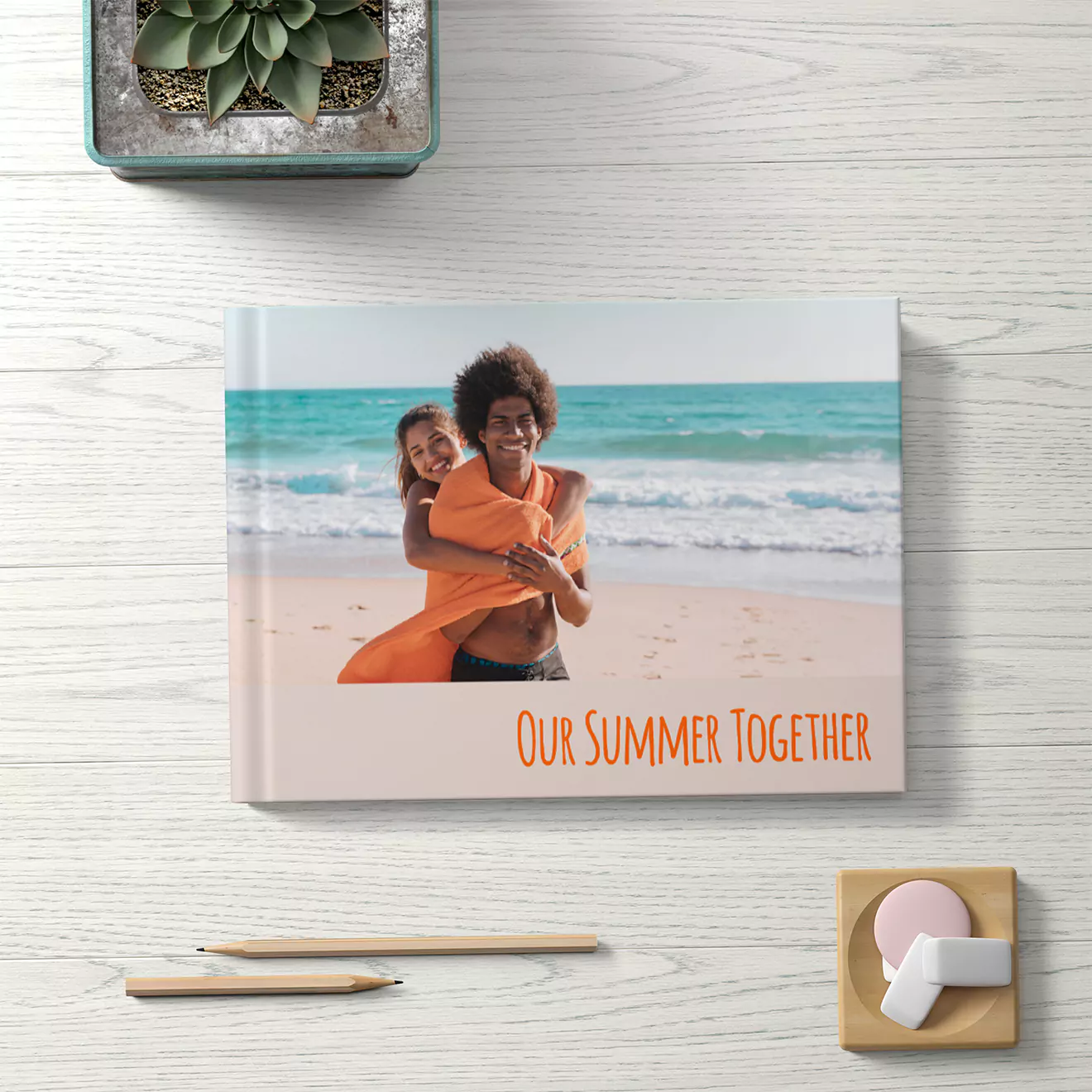 Personalised photo book titled 'Our Summer Together' featuring a beach scene on the cover. Ideal for gifts such as baby showers, Christmas, or Valentine's Day. Perfect for preserving summer memories.