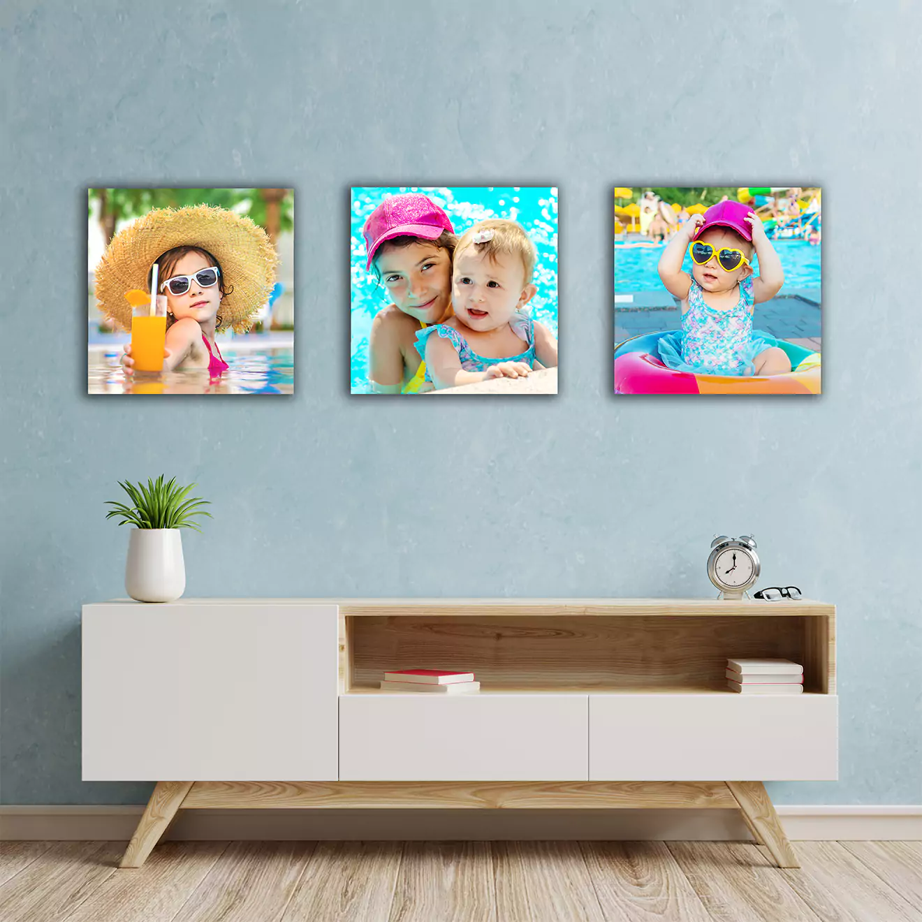 Triptych canvas set displayed above a mantelpiece, showcasing three vibrant images of kids playing in a pool, bringing lively and joyful energy to the room.