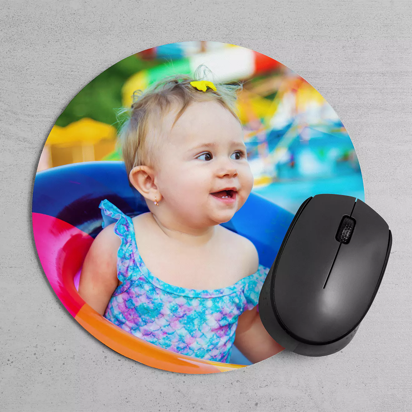 Round mouse pad displayed on a desk, featuring a vibrant image of a golfer in mid-swing, perfect for adding a personalised touch to your office or home workspace.