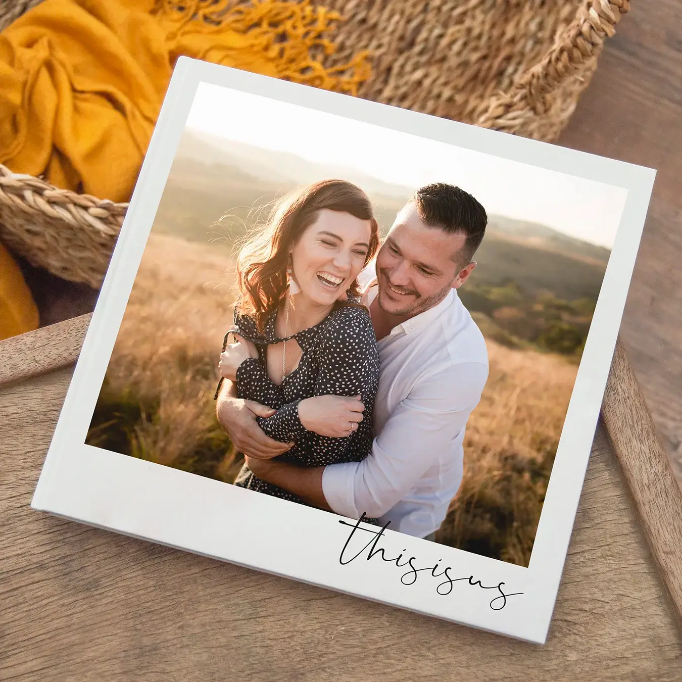 Image of a 30cm square photobook with a loving couple on the cover, showcasing a sleek and modern design ideal for preserving cherished romantic memories in a visually appealing format.