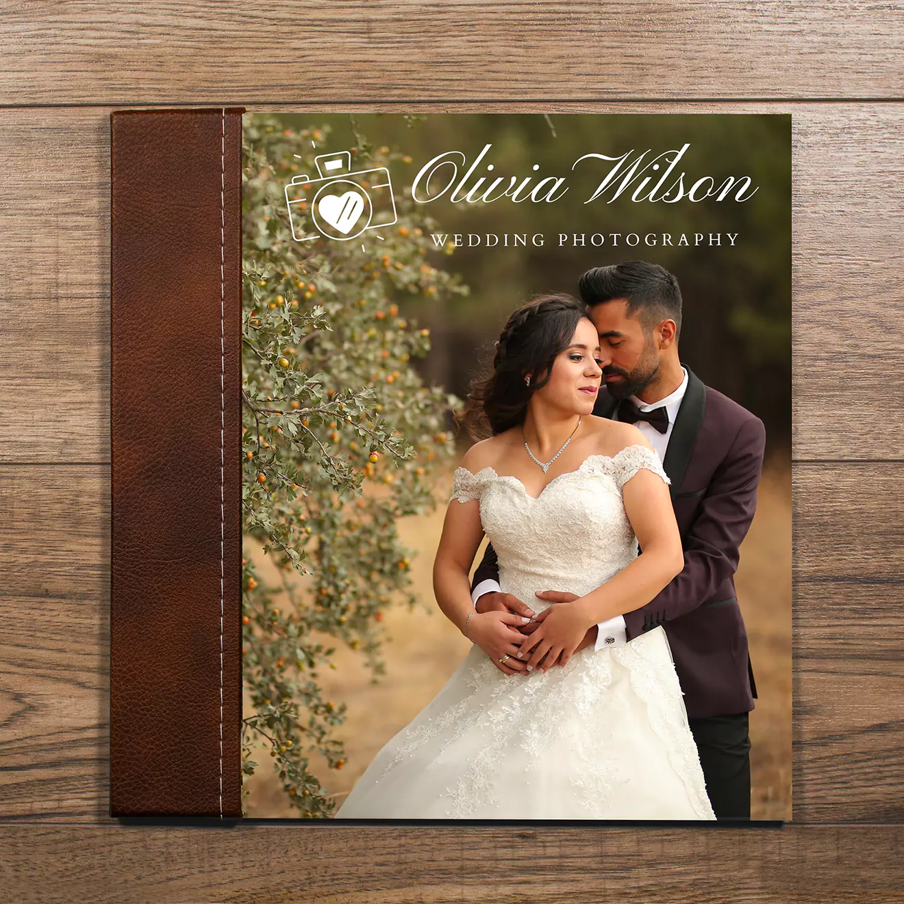 Beautiful leather wedding photo album from Rapidstudio with a photographers branding on the cover. 