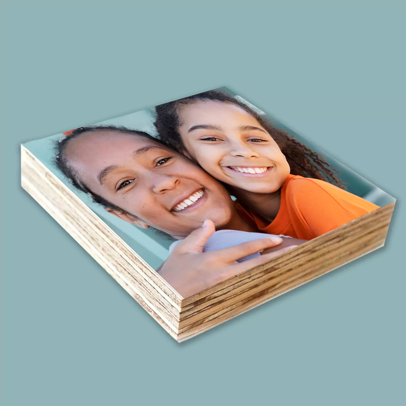 Custom shutterblocks showcasing an adorable baby's portrait, capturing the innocence and charm of early childhood, perfect for decorating a nursery or as a heartfelt gift.