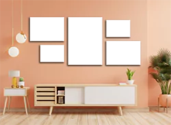 Five-piece canvas wall art set displayed in a modern living room with a peach-coloured wall. The canvases vary in size and are arranged in a visually appealing layout above a white and wooden sideboard. Ideal for personalised gifts, home decor, and special occasions.