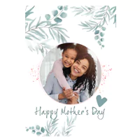 Mother's Day greeting card featuring a circular photo of a smiling mother and daughter, surrounded by blue gum leaf illustrations. The card includes the text 'Happy Mother's Day' and a small heart design.