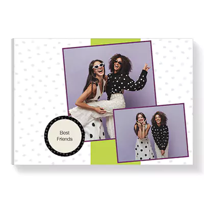 Hardcover photobook with a dotty theme, featuring two photos of friends in black and white polka dot outfits. The cover has a white background with small grey dots, a green vertical stripe, and a circular label with 'Best Friends' text. Ideal for personalised gifts in South Africa, baby shower gift ideas, and Christmas gifts.