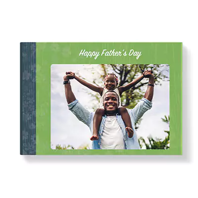 Green-themed hardcover photobook with a 'Happy Father's Day' message on the cover. Features a photo of a father carrying his child on his shoulders. Ideal for personalised gifts, photo albums, and special occasions like Father's Day. Perfect for creating cherished memories.