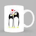 White ceramic mug featuring a charming illustration of two penguins standing close together with red hearts above their heads. Ideal for personalised gifts in South Africa, this mug makes a perfect choice for Christmas gifts, Valentine's Day gift ideas, or gifts for her.