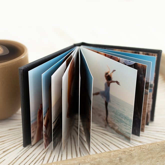 Rapidstudio small bragbook photobook with black linen cover and layflat pages