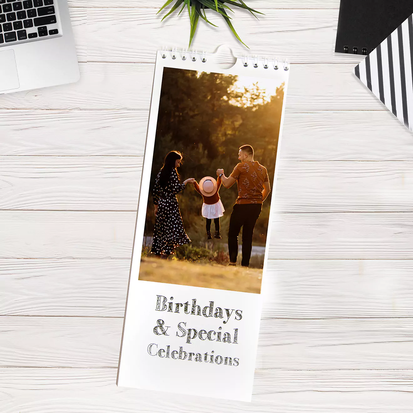 Personalised photo calendar featuring 'Birthdays & Special Celebrations' theme. The calendar showcases family photos and includes a monthly layout for August with space for notes. Ideal for gifts, including Christmas, birthdays, and special occasions. Perfect for keeping track of important dates.