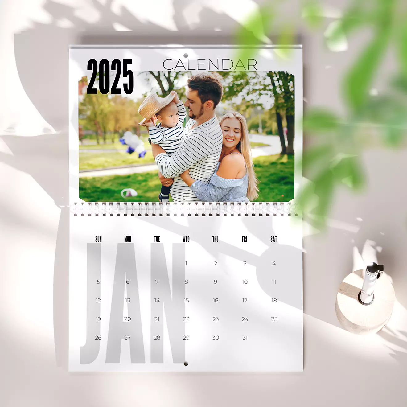 A3 portrait Wall calendar featuring a dad and son image at the top. The calendar displays a month view with days of the week and dates. Ideal for personalised gifts and home decor.