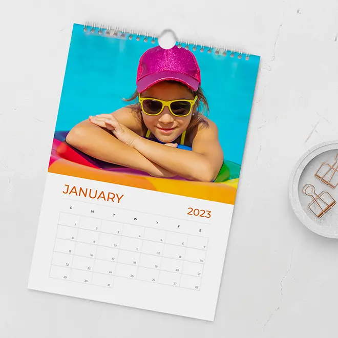 Portrait personalised wall calendar, featuring stunning full-page photos for each month, designed to add a personal touch to your home or office wall space.