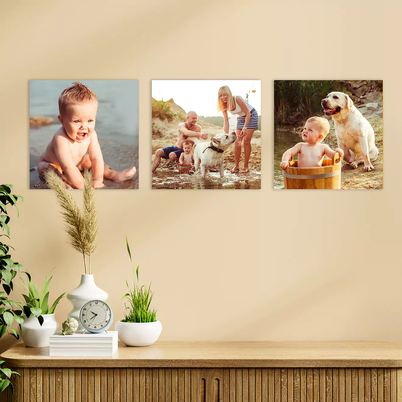 Charming canvas set depicting a baby and their dog enjoying a sunny day at the beach, displayed in a home setting. Perfect for adding a playful and heartwarming touch to any South African residence.