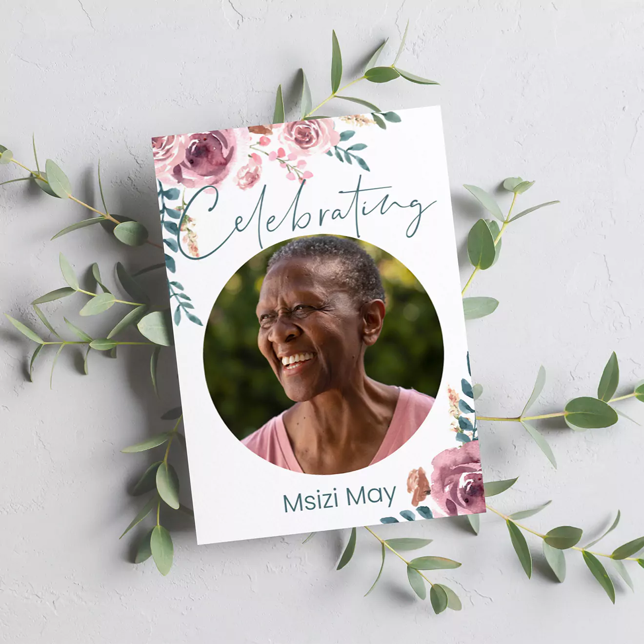 Funeral order of service booklet featuring a smiling elderly woman on the cover, surrounded by floral designs and greenery. The word 'Celebrating' is written at the top, with the name 'Msizi May' at the bottom.