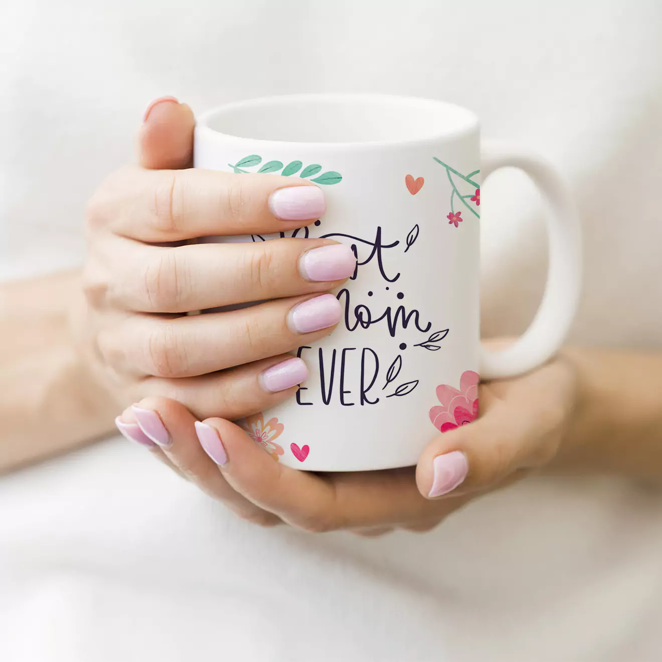 Celebrate Mother's Day with our personalised themed mugs, perfect gifts for her. This mug, held by a delighted mum, makes an ideal present for Mother's Day, showcasing thoughtful and unique gift ideas in South Africa.