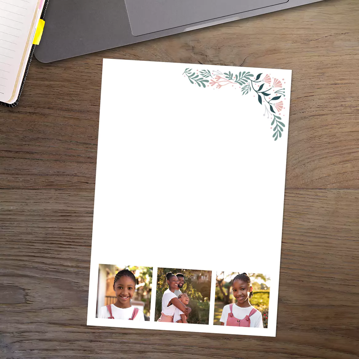 Customisable photo book page featuring a floral design in the top right corner and three small photo slots at the bottom. Ideal for creating personalised gifts such as photo albums, baby shower gifts, or Christmas presents. Suitable for various occasions and themes.