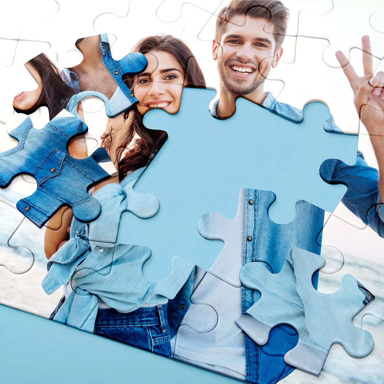 Personalised photo puzzle featuring a smiling couple in casual denim outfits, with several puzzle pieces missing. The puzzle showcases a vibrant and joyful moment, making it an ideal gift for special occasions such as birthdays, anniversaries, or Valentine''s Day.