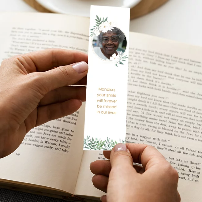 Image of a 'Botanic Memory' bookmark, illustrated with serene botanical themes, ideal for keeping a part of nature’s calm close while remembering a loved one.