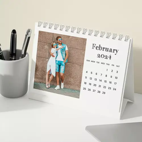 Small-sized personalised desk calendar, compact and perfect for limited spaces, featuring a month-per-page layout with customisable photo options to brighten your work area.