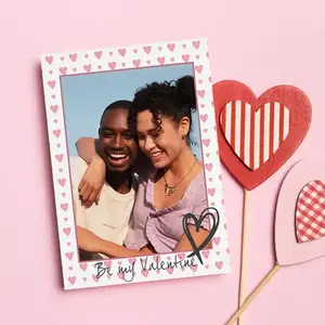 A4 "Love" personalised greeting card, artistically designed to celebrate the essence of love through a heartfelt compilation of cherished moments, adorned with romantic motifs and tender visuals. A romantic gift for your Valentine