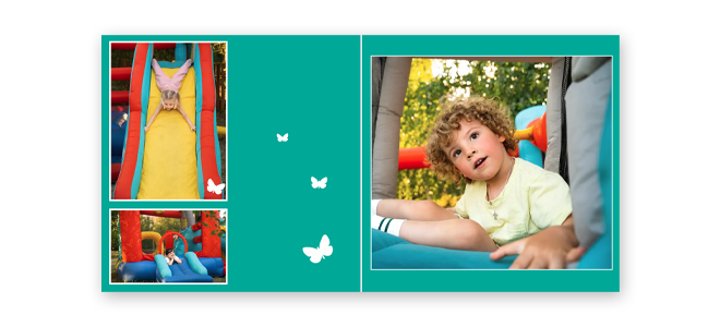 Open photobook with a "Natural Love" theme, featuring vibrant images of a young child playing outdoors. The left page has two smaller photos, while the right page showcases a larger photo. The background is teal with white butterfly accents. Ideal for personalised gifts in South Africa.