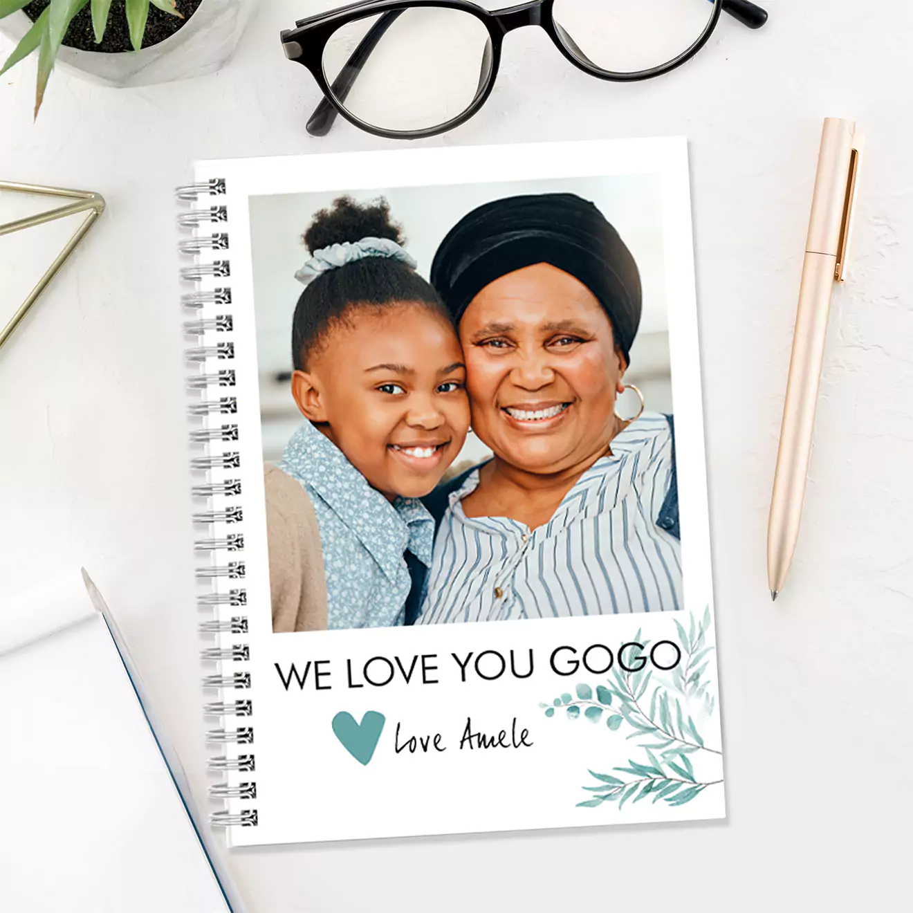 Bluegum-themed personalised A5 soft cover notebook, with an abstract design inspired by the ethereal essence of bluegum trees, blending your photos with soft, abstracted hues of green and blue for a contemporary wall display. Gift for MOM