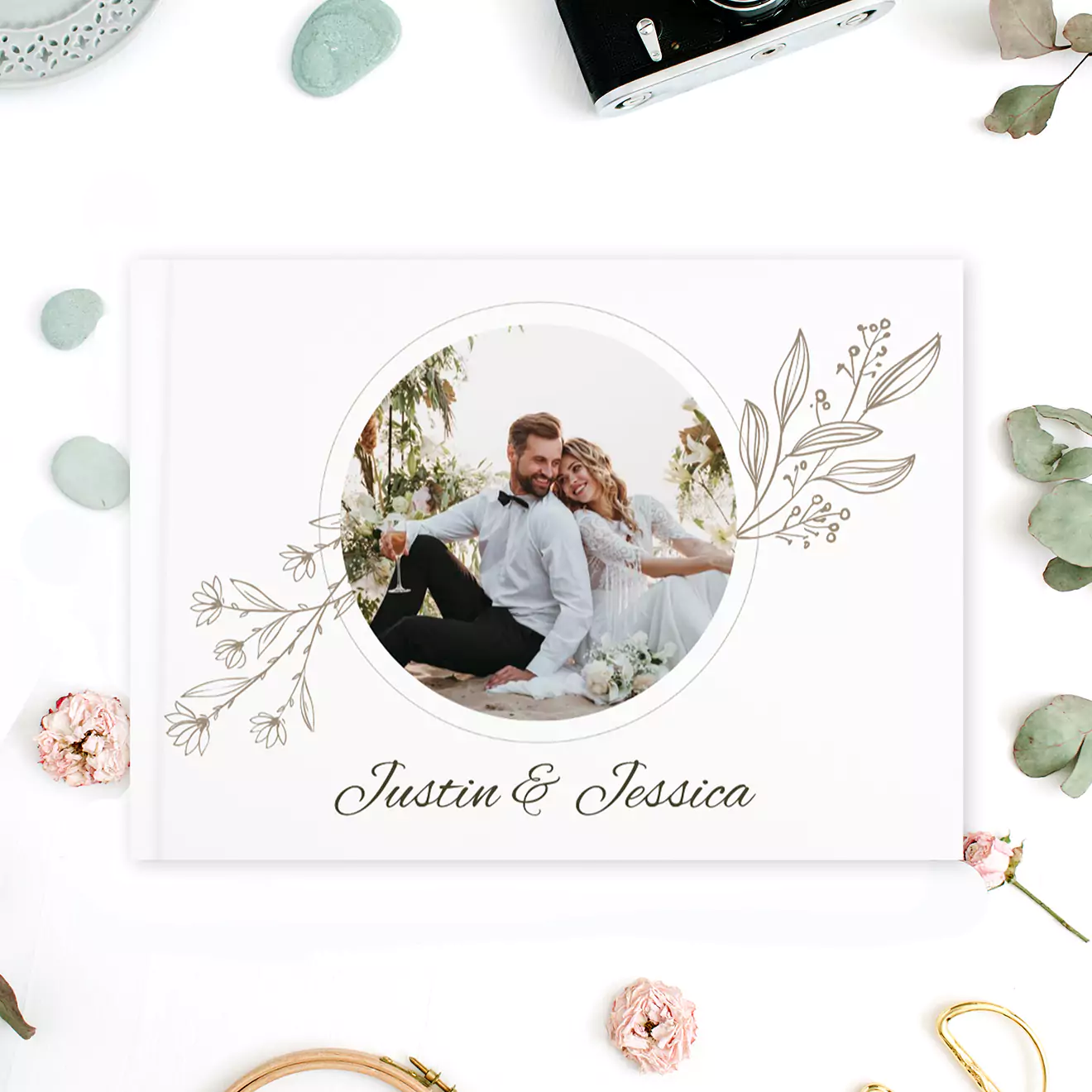 Wedding photo book featuring a happy couple on the cover, capturing their special day