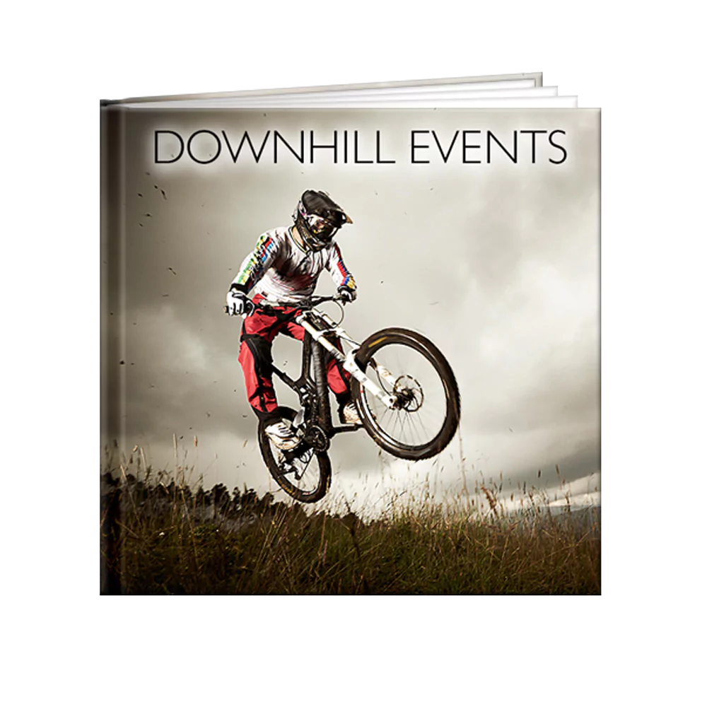 Photo book highlighting a downhill riding adventure, perfect for capturing thrilling outdoor moments