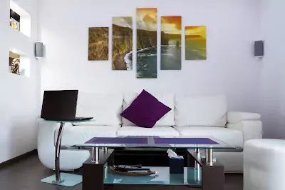 Affordable canvas set displayed on a wall in a stylish living room