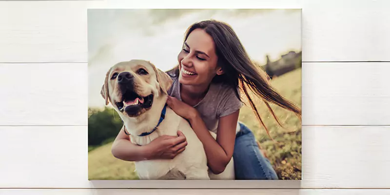 Canvas print of a woman and her dog, showcasing their bond