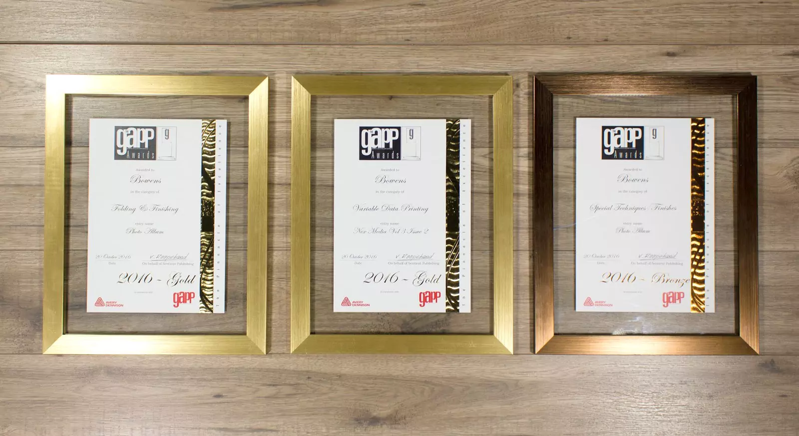 Framed certificates awarded to RapidStudio for outstanding achievements at the GAPP Awards