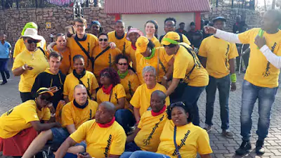 RapidStudio team about to get on a ride together at Gold Reef City during their team-building event