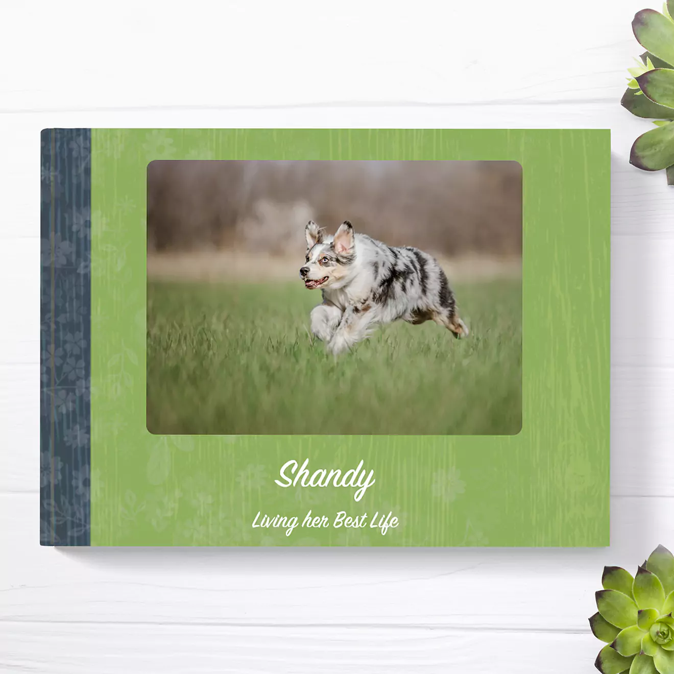 Greenery-themed photo book featuring a dog on the front cover, capturing nature-inspired moments