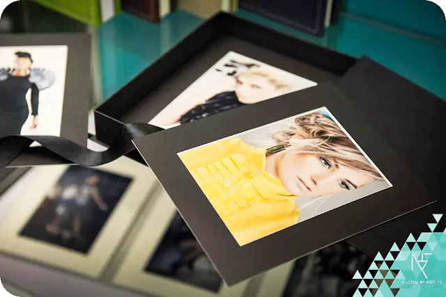 Beautiful framed prints displayed in a stylish folio box, showcasing high-quality photography