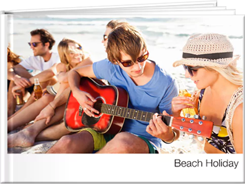 Photobook featuring a young man playing guitar with friends sitting around him, sipping champagne, enjoying a lively moment