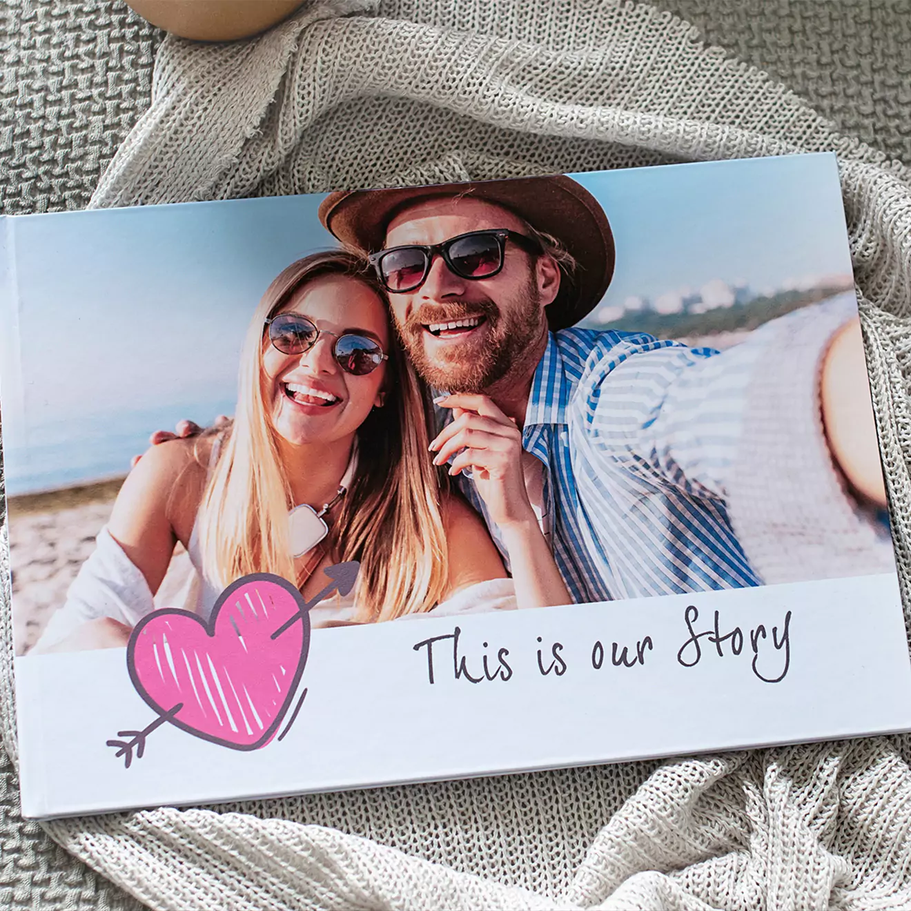 "This Is Our Love Story" photo book, showcasing a couple's journey and treasured memories together