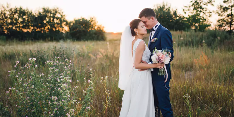 Picture for a Photo book album cover featuring a loving wedding couple, capturing their special moment together