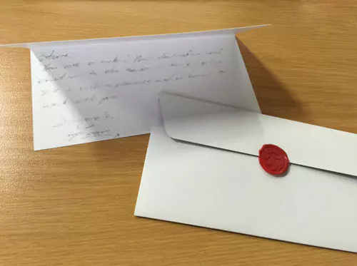 Another picture of staff appreciation letters at RapidStudio, sealed with a wax stamp for a personal and formal touch