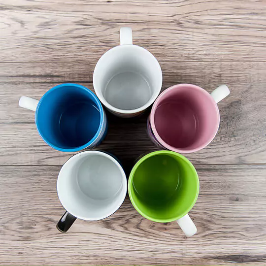 Picture of colourful interiors of coffee mugs, showcasing vibrant and inviting hues