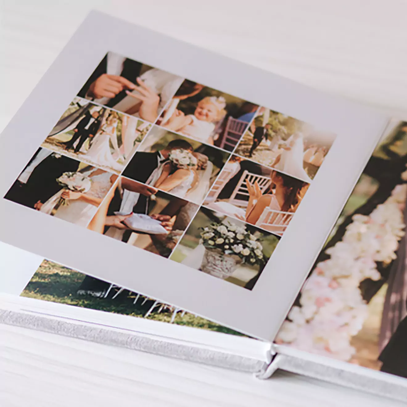 A beautiful wedding album with open pages, displaying cherished moments from a couple's special day