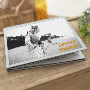 Holiday hardcover photobook with a personalised printed cover
