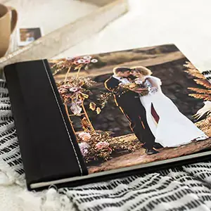 Semi-Personalised printed photobook covers with a luxury panel of leather or canvas